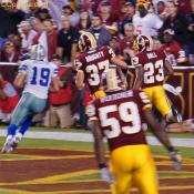 Three Redskins chase a Cowboy into the endzone