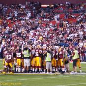 Entire Redskins team huddles