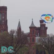 Smithsonian Kite Festival - Kite flying over Smithsonian Building