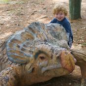 Luke Jr. grinning with Protoceratops