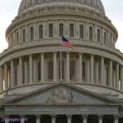Flag flies over U.S. Capitol Building pediment