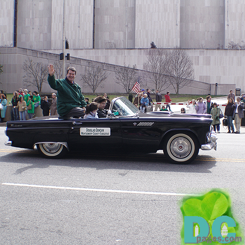 Douglas Duncan, Montgomery County Executive waves to crowd during DC St Patricks Day Parade