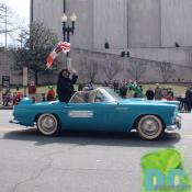 Linda Crop, Chair of DC Council waves to crowd watching the St Patricks Day parade.
