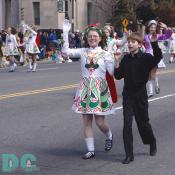 Saint Patricks Day Parade performers wear festive Irish clothing.