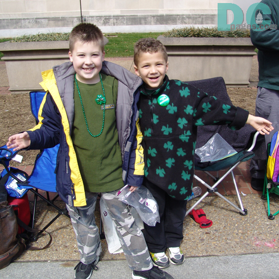 Two Irish boys ham it up during the St. Patricks Day parade.