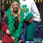 An Irish girl and boy display their emerald smiles during St. Patrick's Day.
