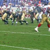 The Midshipmen defensive line get ready to stop VMI from scoring.