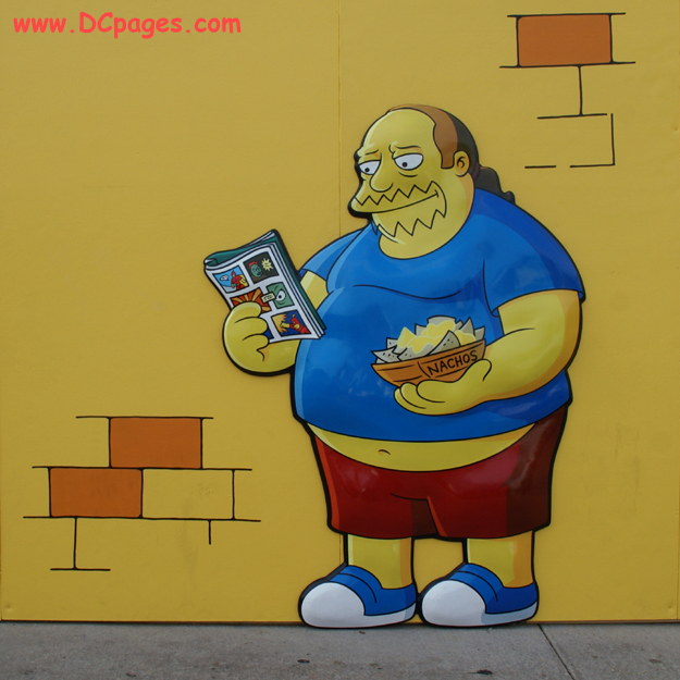Comic Book Guy stands in front of the Bladensburg Kwik-E-Mart.