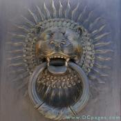 Bronze lion door knocker at the entrance to the House of the Temple.