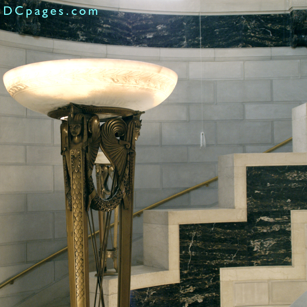 Bronze lamps around a winding Bottcino marble Staircase lights the way to the Temple Chamber.