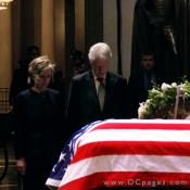 Senator Hillary Rodham Clinton and former President, William Jefferson Clinton bow their heads to honor the memory of a great citizen to our country.