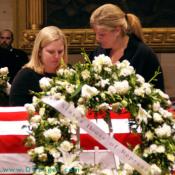 Two of President Ford's grandchildren shed tears in front of his honored casket.