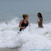 Ocean City - This woman braces herself for the breaking wave. The man in the background was not so lucky.
