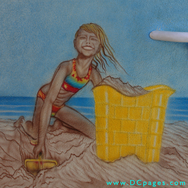 Ocean City - Restaurant entrance mural of a young girl playing in the sand.