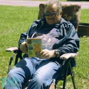 Frank Summers from Harrisonburg, Virginia forgets about his strenuous workweek by enjoying a good book and warm sunshine. "The best thing about North Fork is being able to just sit down and relax." Tel.540.636.2995