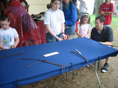 They had a table out so attendees could learn how to braid leather
