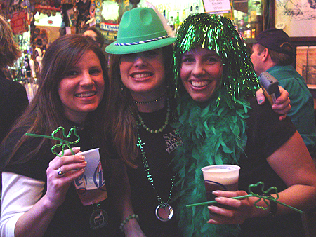 "Slàinte!" These green dressed ladies give a Gaelic toast to your health (pronounced "sLAWN-cha").