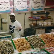 Sellers display fish attractively to lure customers.