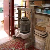 Great British Pine Mine - This wine press is from Eger in Hungary, home of the famous Egri Bikaver or Bull's Blood red wine. It stands over 6.5'tall and features an oak frame with Balkan rose marble.
