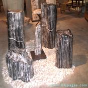 An assortment of fully polished and sculpted petrified teak from Sumatra, Indonesia. Estimated age is 8-12 million years old. Incredible grain and color. Suitable for indoor/outdoor staging. These works are 18-58 inches tall. Can be incorporated with fountains.