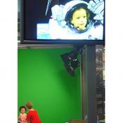 This little girl is having a astronauts image superimposed over her cute image.