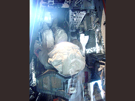 Astronaut in space capsole.