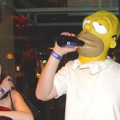 Homer Simpson drinking a brewski with his girl fiend. I thought he was a Duff bear man.