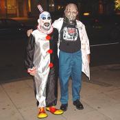 Oh #!?@ it's Captain Spaulding the store keeper, and Dr. Satan from the movie The House of a 1000 Corpses, a Rob Zombie movie. HAPPY HALLOWEEN.