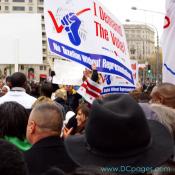 Mayor Adrian M. Fenty looks out a crowd of demonstators ready to begin the DC Voting Rights March.