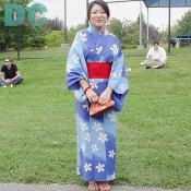 A lady in a beautiful yukata took a moment to smile for the camera. 