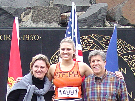 Stephanie and her family pose on the winner's podium before the race. Every runner was a winner.