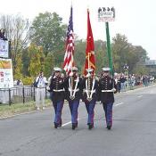 US Marines in the Dress Blue Uniform present colors before the race.