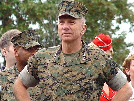 The commandant of the Marine Corps, General Hagee reviews the troops and staff before the beginning of the race.