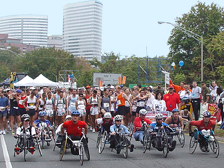 The wheelchair racers were the first to start the race.