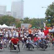 The wheelchair racers were the first to start the race.