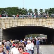 People watched the runners from the top of a bridge.