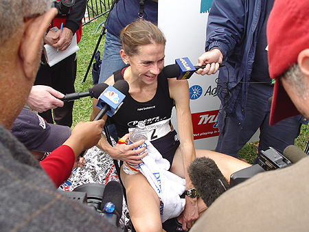 Hanscom answers questions from the press. She trains in the same group as Peter Sherry, the men's winner of the Marathon.