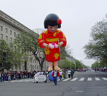 2003 Cherry Blossom Festival: Spectators are treated to giant floats along Constitutional Avenue.