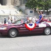 The woman in the back of the car is beautiful Miss DC, Lisa Ferris