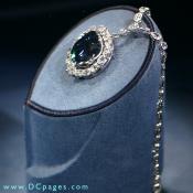 In the pendant surrounding the Hope diamond are 16 white diamonds, both pear-shapes and cushion cuts.