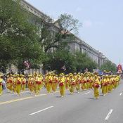 Cool yellow parade costumes created for Falun Gong representatives