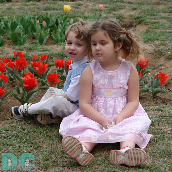 Two children reflect the joy Spring.