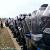 Virginia State Police stand in tight formaton to block the protesters from entering the Pentagon Reservation. 