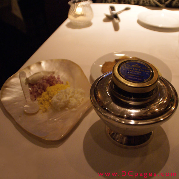Plaza De Caviar is the top brand of fresh Russian caviar served with Russian blini potato pancakes, chopped eggs, and onions.