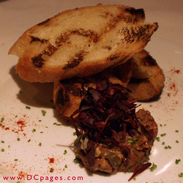 Steak Tartare served with grilled crouton.