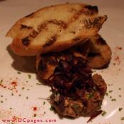 Steak Tartare served with grilled crouton.