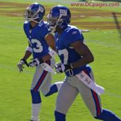 Giants players run out to Fedex Field.
