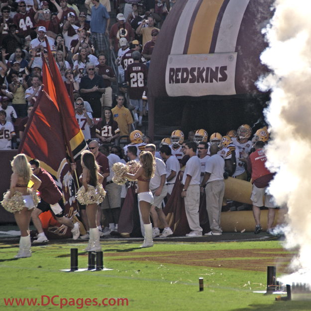 The sound of thunderous cannons explode as the Washington Redskin team enter Fedex Field. The classical music from the movie "Gladiator" is blasted from the screen.