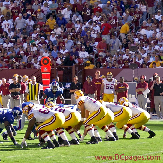 Redskins Offense in formation. Al Saunders controls the plays of the game.