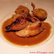 French Pouisson - A savory brined and roasted ½ pouisson (Small Chicken) served with palov croquette and Madeira reduction.
